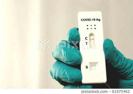 Doctor with Covid-19 test kit from the lab at the hospital Doctor with Covid-19 test kit from the lab at the hospital 81875462