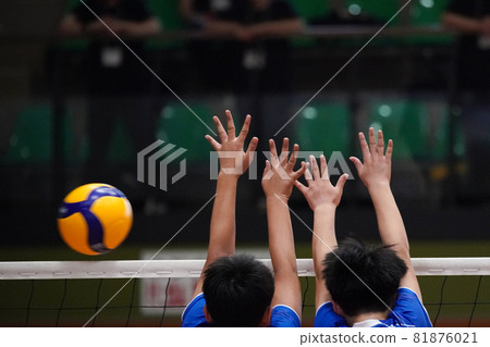 At hand at the moment of blocking volleyball near the net At hand at the moment of blocking volleyball near the net 81876021