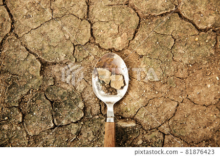 World Food Problem Concept. Environmental Impact. Global Issues in Agricultural Food Production. Cracked Soil, Desertification, Water, Pollution, Energy and Climate Change 81876423