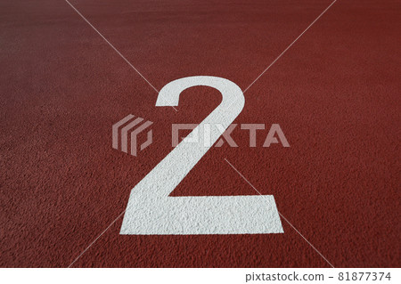 Lane number written on the track and field track of the athletics stadium 81877374