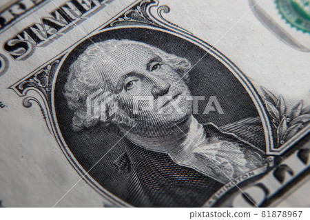Macro close up of a 1 US dollar banknote. Close up of a one American dollar note. US dollar is the world currency. The portrait of George Washington, the first president of the United States. Macro close up of a 1 US dollar banknote. Close up of a one American dollar note. US dollar is the world currency. The portrait of George Washington, the first president of the United States. 81878967