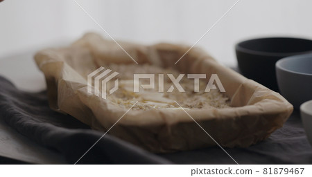 making granola at home, pour honey 81879467