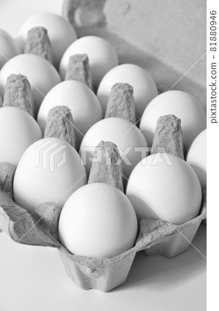 Fresh organic white eggs in a carton package, isolated on white background 81880946