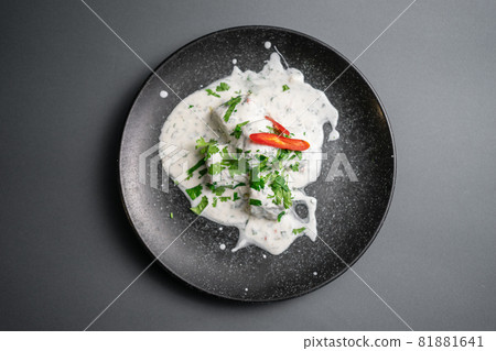 traditional georgian food gebjalia with matsoni cheese and red chili pepper 81881641