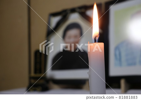 Candle flame, deceased and mortuary tablet 81881883