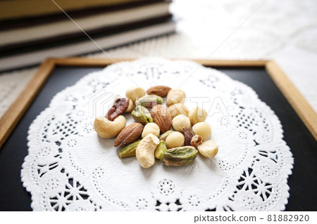 Mixed nuts and books 81882920