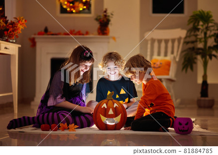 Kids in witch costume on Halloween trick or treat Kids in witch costume on Halloween trick or treat 81884785