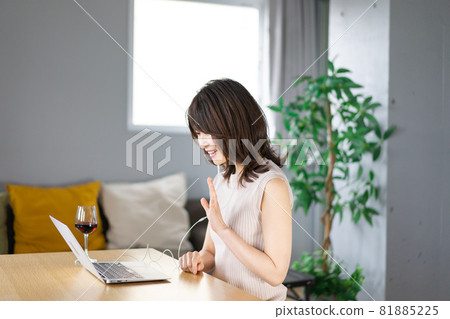 Young women taking online English conversation Young women taking online English conversation 81885225