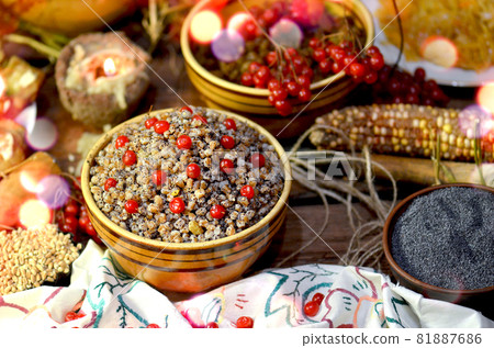 Sweet wheat kutia with nuts, poppy seeds, dried fruits. 81887686