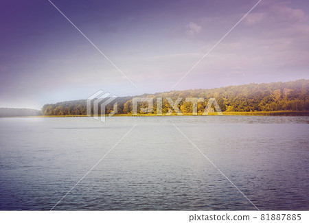 Island with colorful autumn trees. Island with colorful autumn trees. 81887885