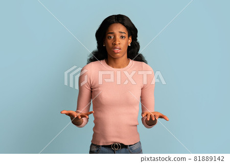 I Don't Know. Unsure Young Black Female Shrugging Shoulders And Spreading Arms 81889142