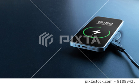 Phone charge. Mobile cell phone charge battery from wireless smart charger. Modern technology, portable fast charger. 81889423