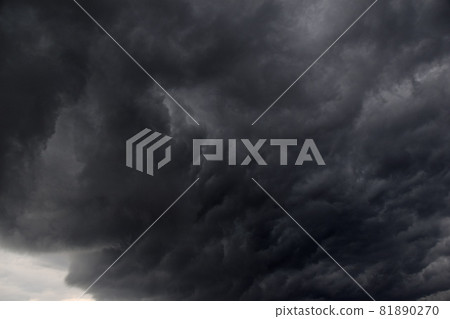 Storm hurricane blue leaden torn clouds on the horizon 81890270