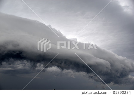 Storm hurricane blue leaden torn clouds on the horizon Storm hurricane blue leaden torn clouds on the horizon 81890284