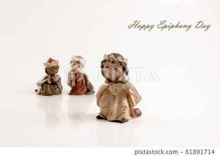 Happy Epiphany day concept. Three ceramic figures of wise boys isolated on white background. Happy Epiphany day concept. Three ceramic figures of wise boys isolated on white background. 81891714