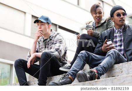 Group of diversity friends smoking Group of diversity friends smoking 81892159