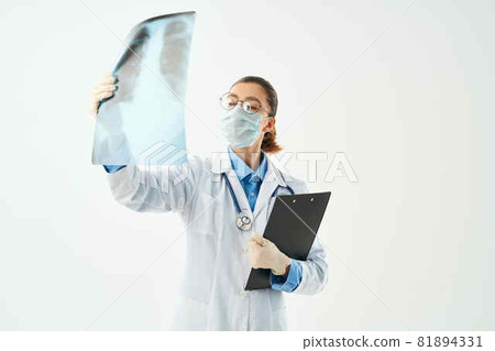 female doctor in medical mask x-ray hospital examination female doctor in medical mask x-ray hospital examination 81894331