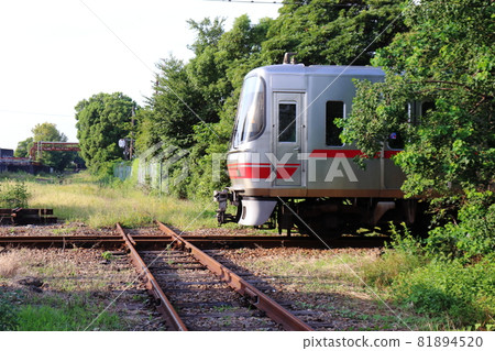 Meitetsu-Chikko Line trains passing through diamond crossing 81894520