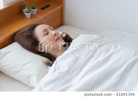 Sleeping senior woman Sleeping senior woman 81895399