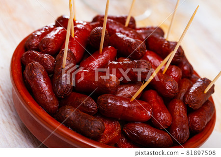 Grilled mini sausages chistorra 81897508