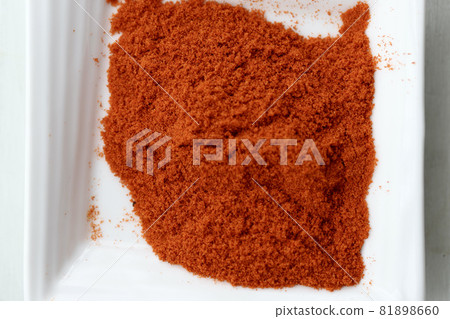 Red pepper on a small plate, hot spice 81898660