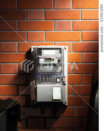 Electric meter installed on the wall Electric meter installed on the wall 81901984