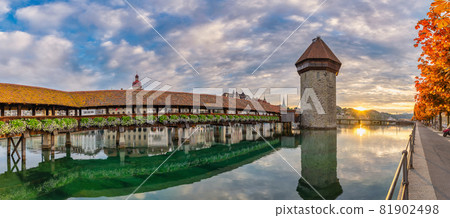 Lucerne (Luzern) Switzerland, panorama sunrise city skyline at Chapel Bridge with autumn foliage season 81902498