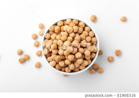 Chickpea in white bowl on white background Chickpea in white bowl on white background 81908316