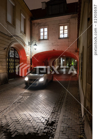 Single Car On City Street At Night 81908697