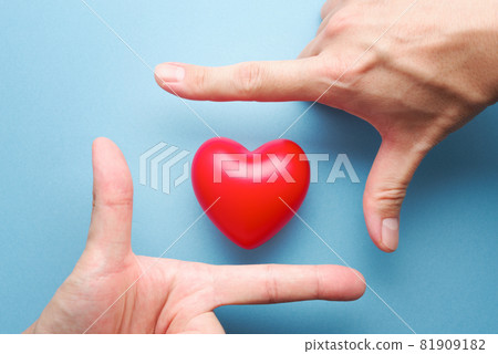 An image that focuses on the heart. Physical and mental health. Heart-shaped and hand-made frame. 81909182