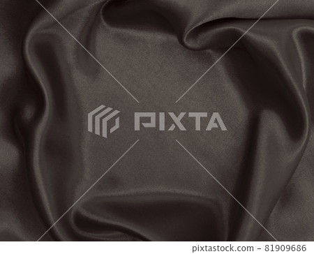 Smooth elegant brown silk or satin luxury cloth texture as abstract background. Luxurious background design wallpaper. In Sepia toned. Retro style Smooth elegant brown silk or satin luxury cloth texture as abstract background. Luxurious background design wallpaper. In Sepia toned. Retro style 81909686
