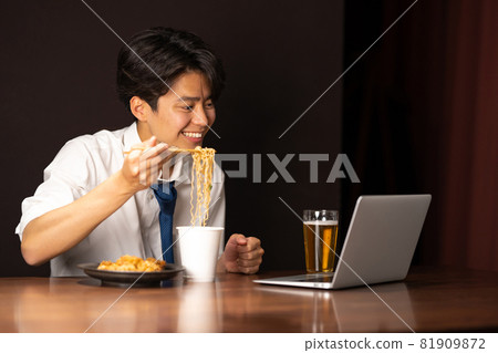 Businessman midnight snack cup ramen Businessman midnight snack cup ramen 81909872