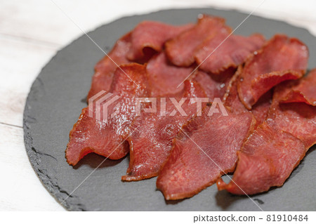 Beef tongue on a plate 81910484
