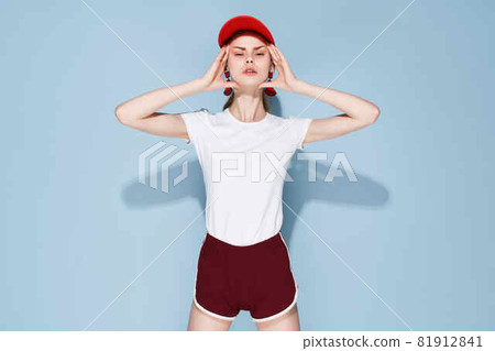 woman in red cap summer fashion glamor posing isolated background woman in red cap summer fashion glamor posing isolated background 81912841