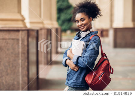 Successful Black Student Girl Posing At University Campus Territory Outdoor Successful Black Student Girl Posing At University Campus Territory Outdoor 81914939