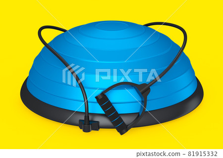 Blue fitness ball with hand expander isolated yellow background Blue fitness ball with hand expander isolated yellow background 81915332