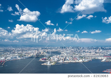 《Osaka Prefecture》 Osaka cityscape with blue sky and white clouds, Osaka bay area in summer sky 81919063