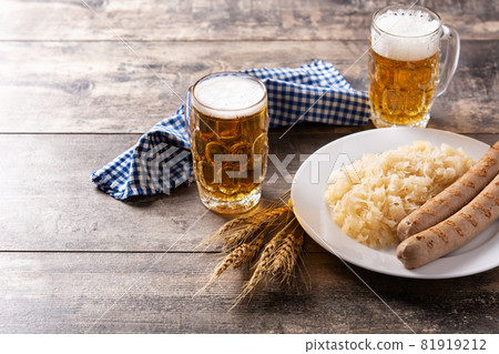 Bratwurst sausage ,sauerkraut, pretzels and beer 81919212