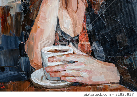 .The girl is drinking coffee in a cafe. 81923937