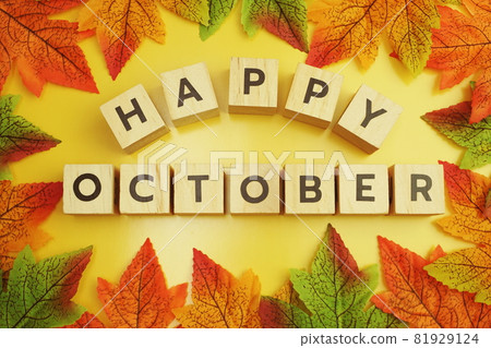 Happy October alphabet letter with maple leaves frame on wooden background Happy October alphabet letter with maple leaves frame on wooden background 81929124