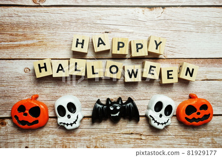 Happy Halloween alphabet letters top view on wooden background Happy Halloween alphabet letters top view on wooden background 81929177