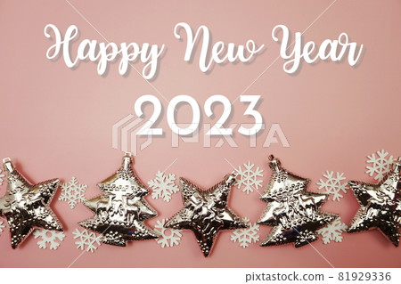 Happy New Year 2023 Decoration with Christmas ornament Flat lay on pink background Happy New Year 2023 Decoration with Christmas ornament Flat lay on pink background 81929336