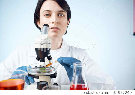 woman laboratory assistant microscope research diagnostics science work woman laboratory assistant microscope research diagnostics science work 81932240