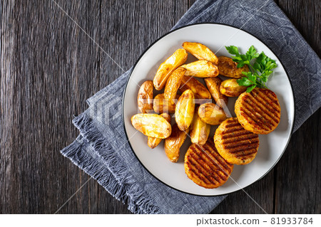 grilled fish burgers with baked potato wedges grilled fish burgers with baked potato wedges 81933784