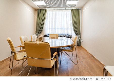 oval table in the meeting room. furniture for office and work. oval table in the meeting room. furniture for office and work. 81934977