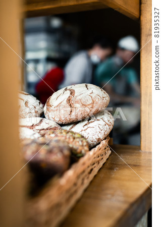 Rye bread on the counter in a rattan basket Rye bread on the counter in a rattan basket 81935327