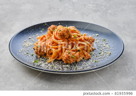 Spaghetti pasta with meatballs and cheese Spaghetti pasta with meatballs and cheese 81935996