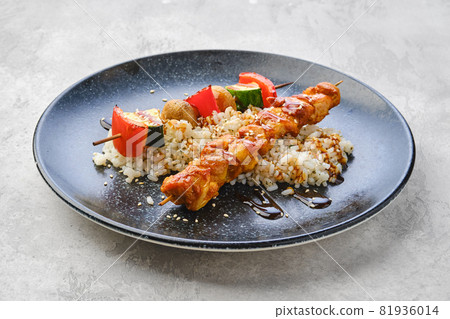 Shashlik with chicken and grilled champignon with bell pepper and zucchini Shashlik with chicken and grilled champignon with bell pepper and zucchini 81936014