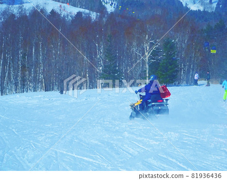 Snow mountains and snowmobiles 81936436