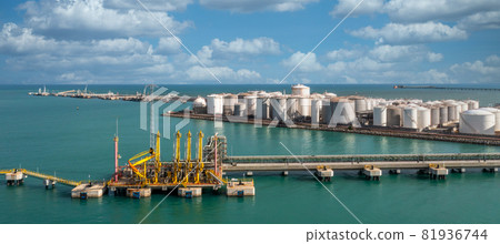 Aerial view industrial crude oil and fuel tanker ship at deep ocean sea port, Tanker ship vessel at terminal port, Business import export oil and gas petrochemical by tanker ship transportation oil. Aerial view industrial crude oil and fuel tanker ship at deep ocean sea port, Tanker ship vessel at terminal port, Business import export oil and gas petrochemical by tanker ship transportation oil. 81936744